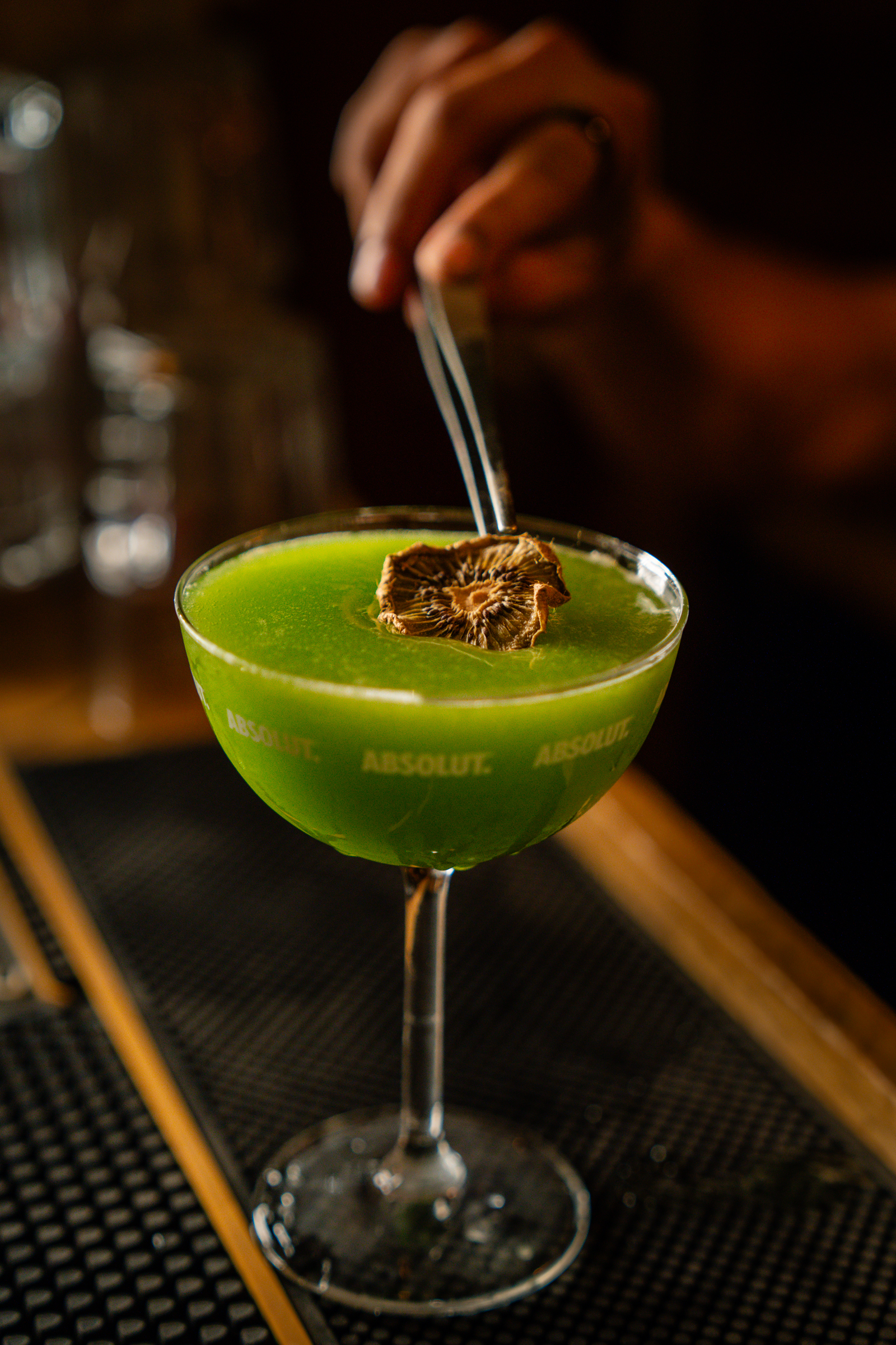 A vibrant, refreshing Kiwi Martini made with real fresh kiwi pulp at the bar of BlendHouse in Utrecht.
